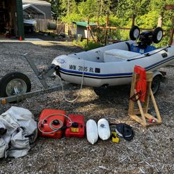 Zodiac Zoom, 15hp Mercury, EZ Loader trailer