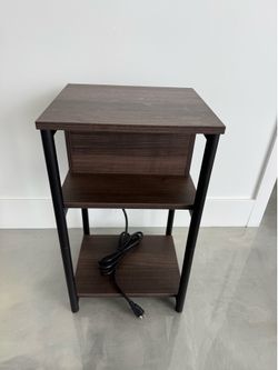 Dual shelf side table with outlets