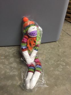 Brand new stripped sock monkey stuffed animal