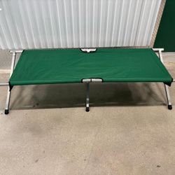 Foldable camping cot  in a bag. 6 feet long , 25” wide , 17” high $40