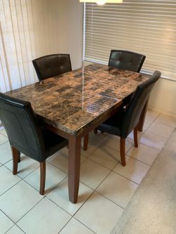 Dining room table with four chairs
