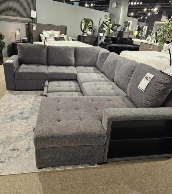Dark gray sectional sleeper sofa with pull out sofa bed