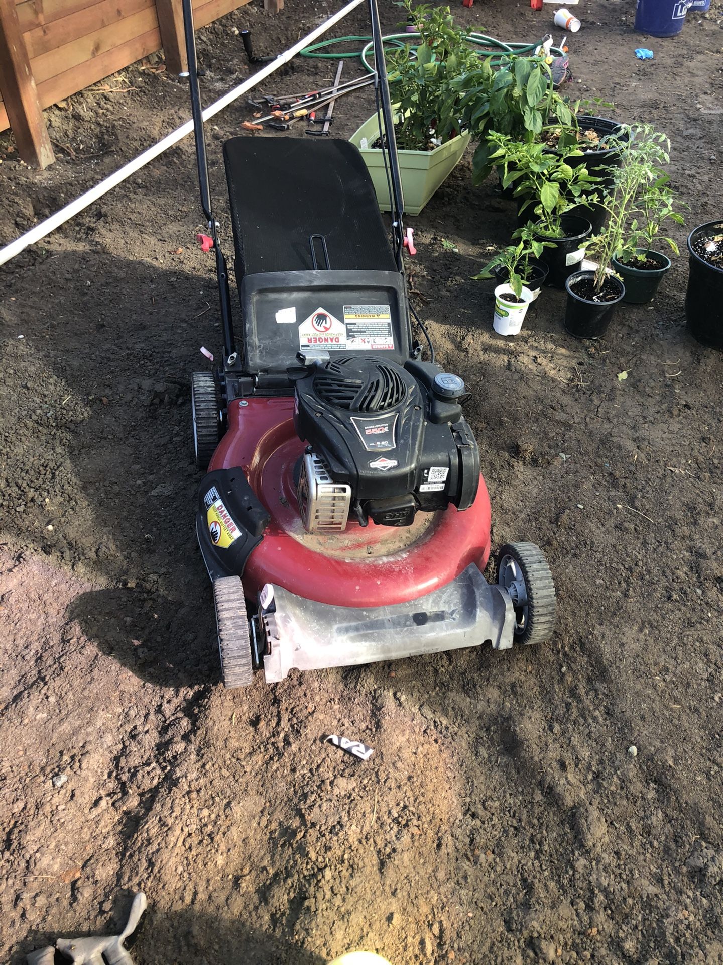 Free Briggs Stratton mower (will not quite start)