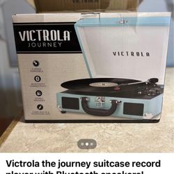 Victrola the journey suitcase record player with Bluetooth speakers!