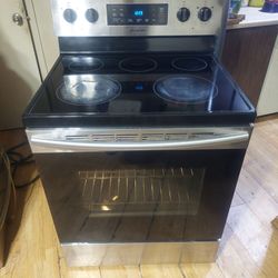 Reduced-Black and Stainless Samsung 5 Burner glass top stove with Self Cleaning Oven Works Excellent