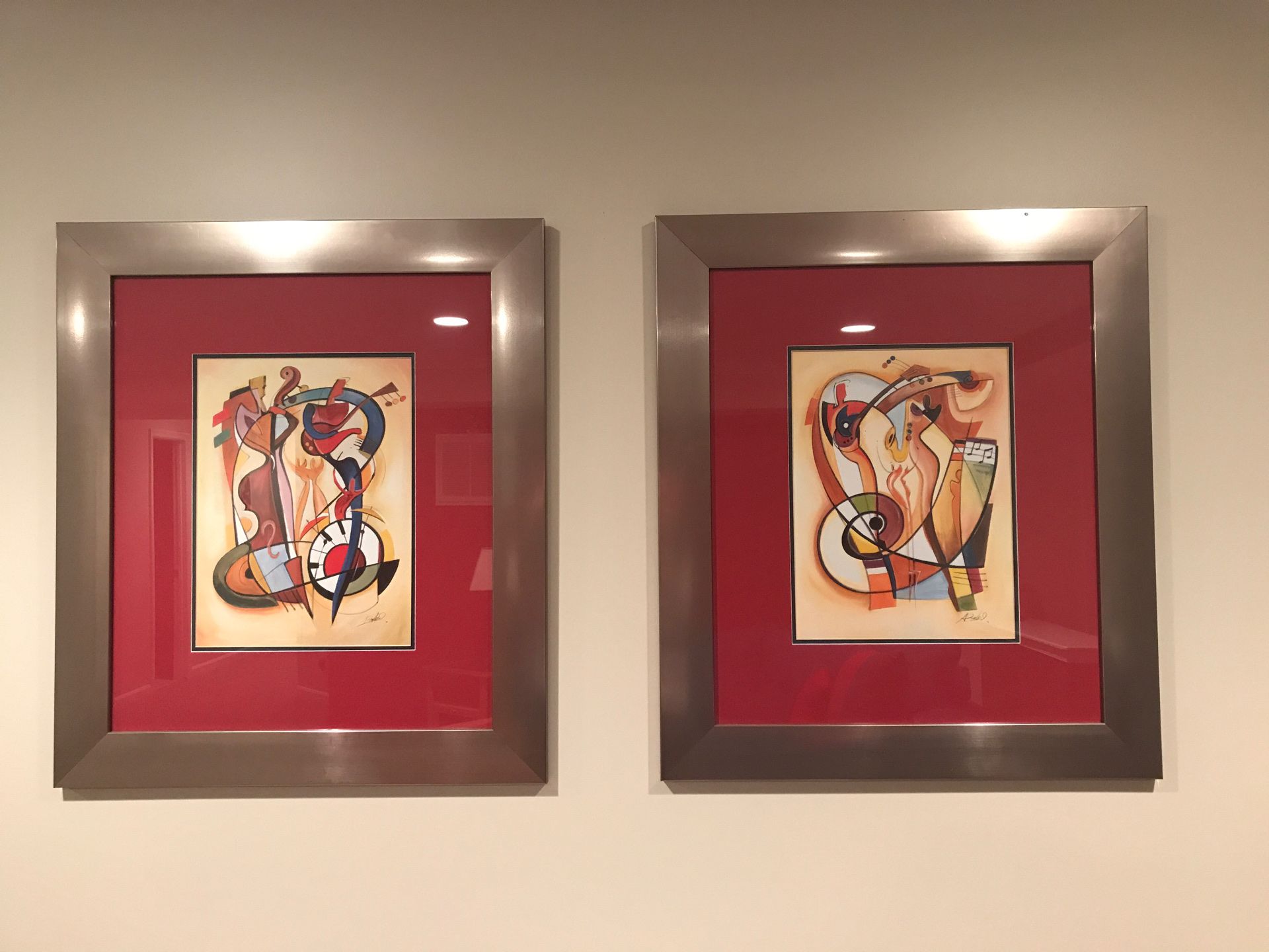 Two pairs of Modern Musical Art in Silver Frames