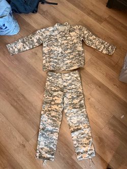 Boys U.S. Army ACU digital camouflage field jacket and pants set featuring the distinctive gray-scale pixelated pattern.Pattern: Universal Camouflage 