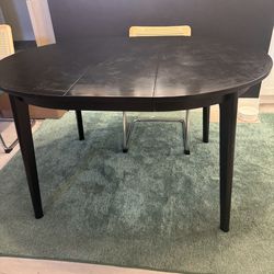 Black extendable dining table