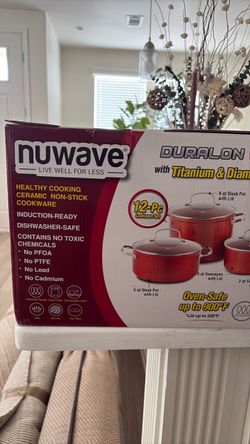 Nu Wave cooking hot plate, with a complete set of pots and pans.