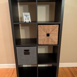 Black IKEA KALLAX bookcases
