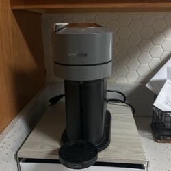 Nespresso Coffe Maker $80. And Storage For Pods $25 