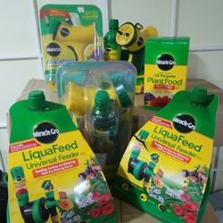 5 liquafeed bottle with feeders and 1 all plant purpose. $80 value