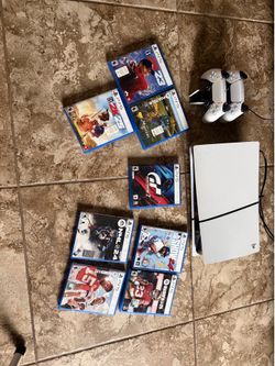 PlayStation 5 slim w/ games and controllers