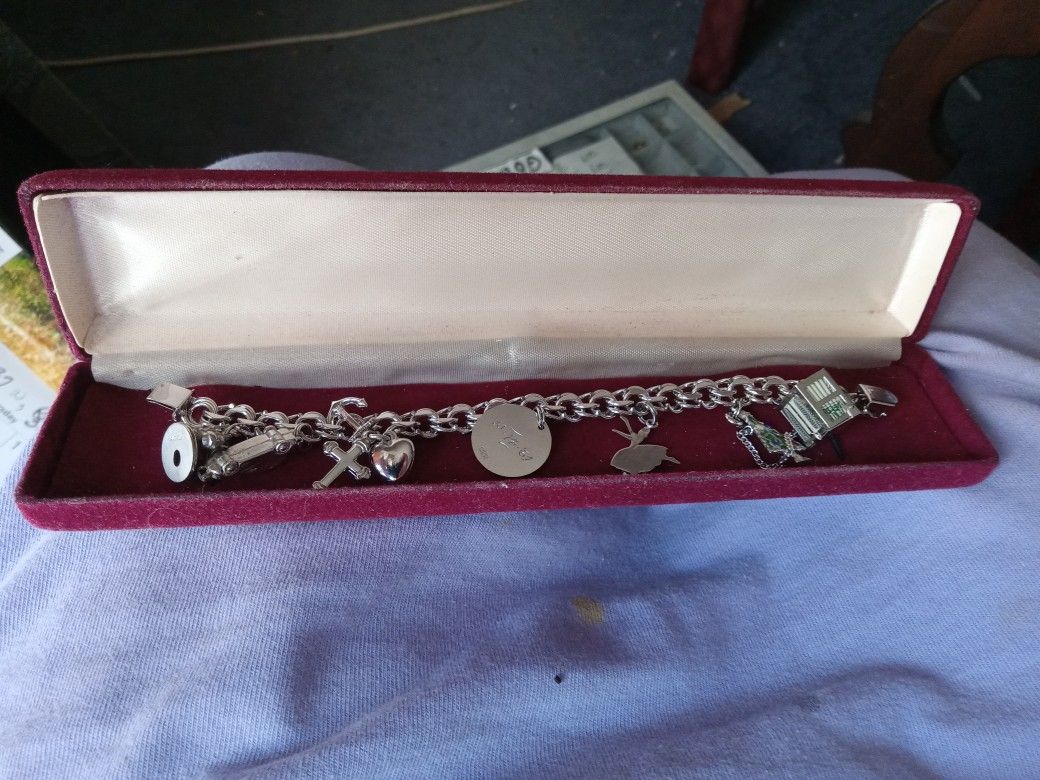 Sterling Silver Charm Bracelet With 9 Charms