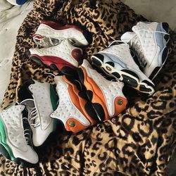 Four pair of Air Jordan 13