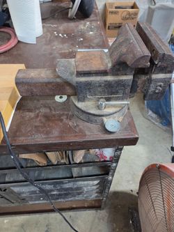 Two heavy duty old school counter mounted vises