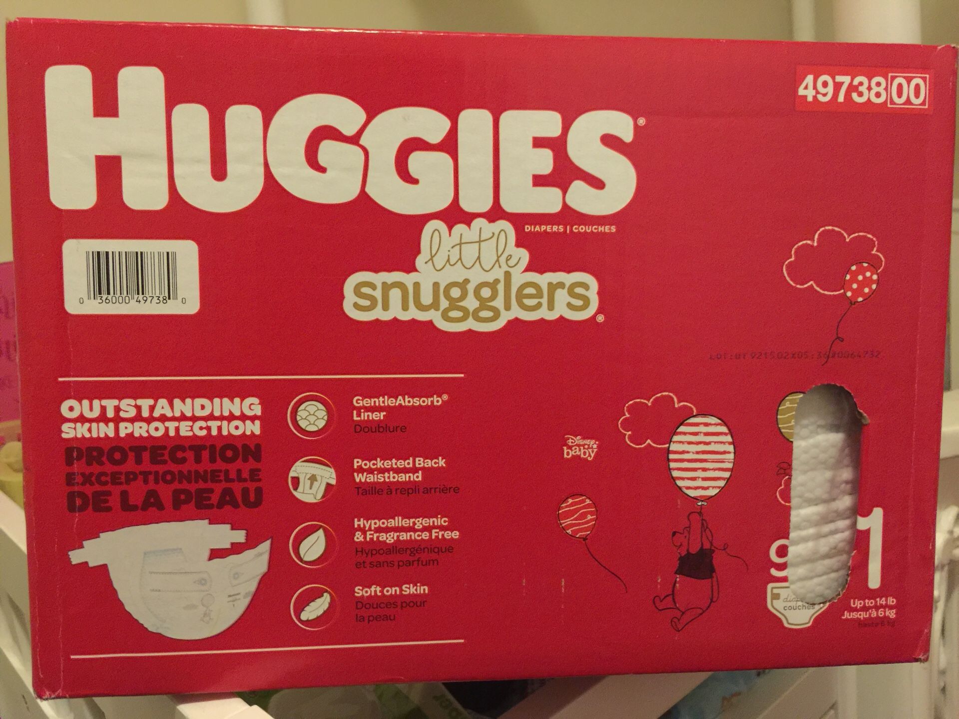 Huggies one month diapers/ pampers