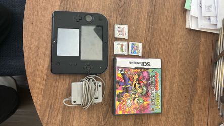 Used 2ds + charger + 4 games