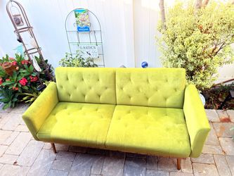 Futon type love seat/couch. Avocado green velvet
