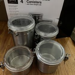 Four Stainless Steel Canisters