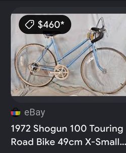 bicycle appears to be a vintage Murray. Phoenix, a 10-speed or 12-speed road bike produced