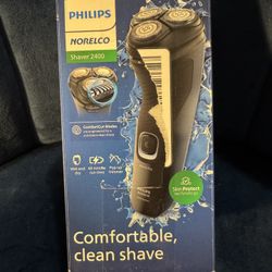 Philips Norelco Shaver 2400 Series, a wet and dry electric shaver with a pop-up trimmer