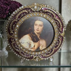 High End Vintage decorative, round tabletop picture frame jeweled design with burgundy enamel accents. Includes Victorian image 