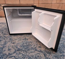 Haier branded black compact mini fridge, 3.3 cubic feet