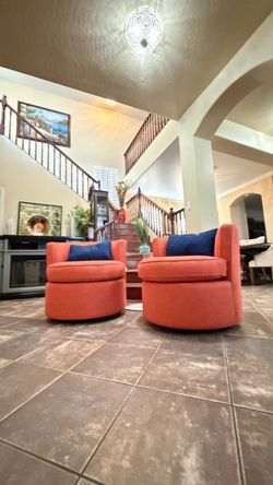 Beautiful set of two Carly swivel accent chairs in excellent conditions