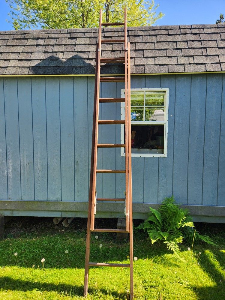 Functional/Antique wooden extension ladder in good condition - $100 or best offer (OBO)