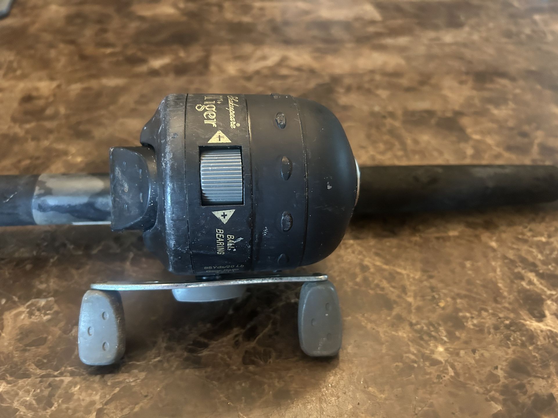 3 Fishing Reels And 2 Fishing Rods