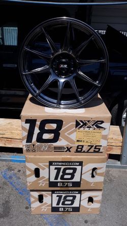 4 new wheels  18 x8.75  xxr527 chromium black offset 35.  5 by 4.5&100 $660