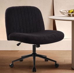 Black fluffy criss cross chair in box