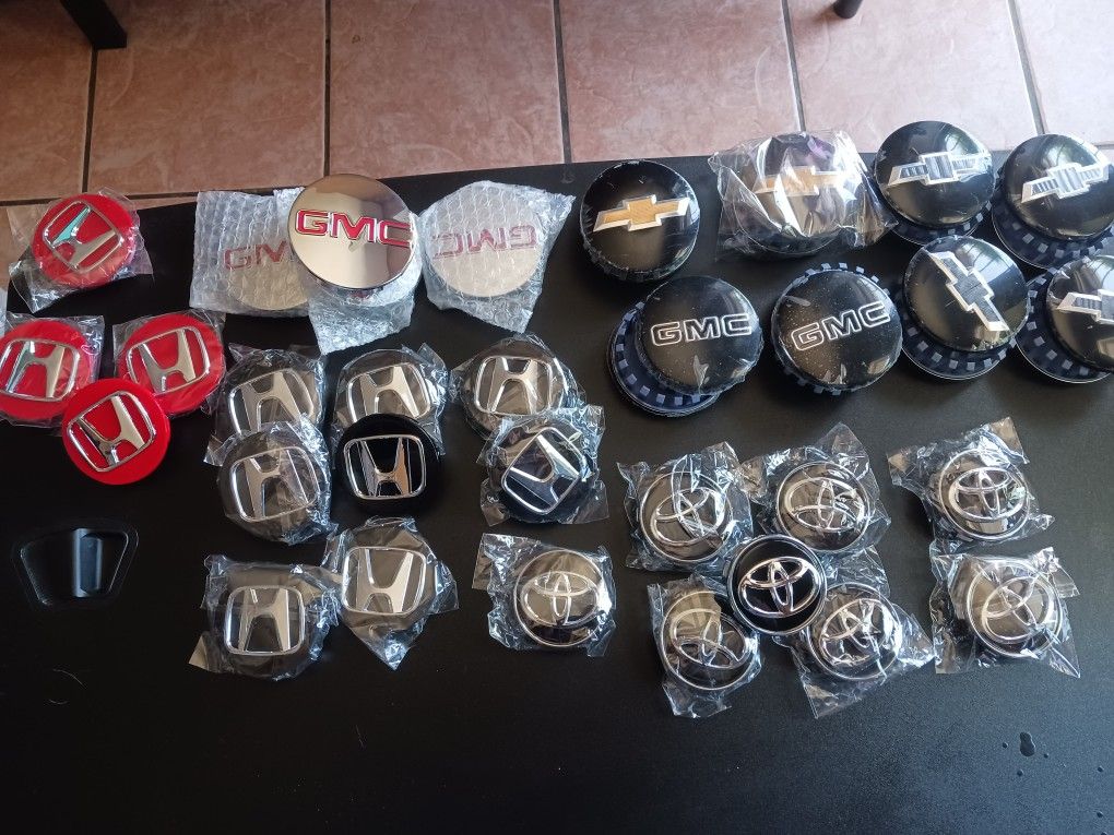 TAPAS DEL CENTRO PARA RRINES TOYOTA CHEVROLET HONDAS NUEVAS