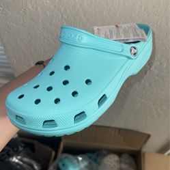 Turquoise Crocs 