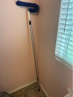 To clean dust from ceiling fan