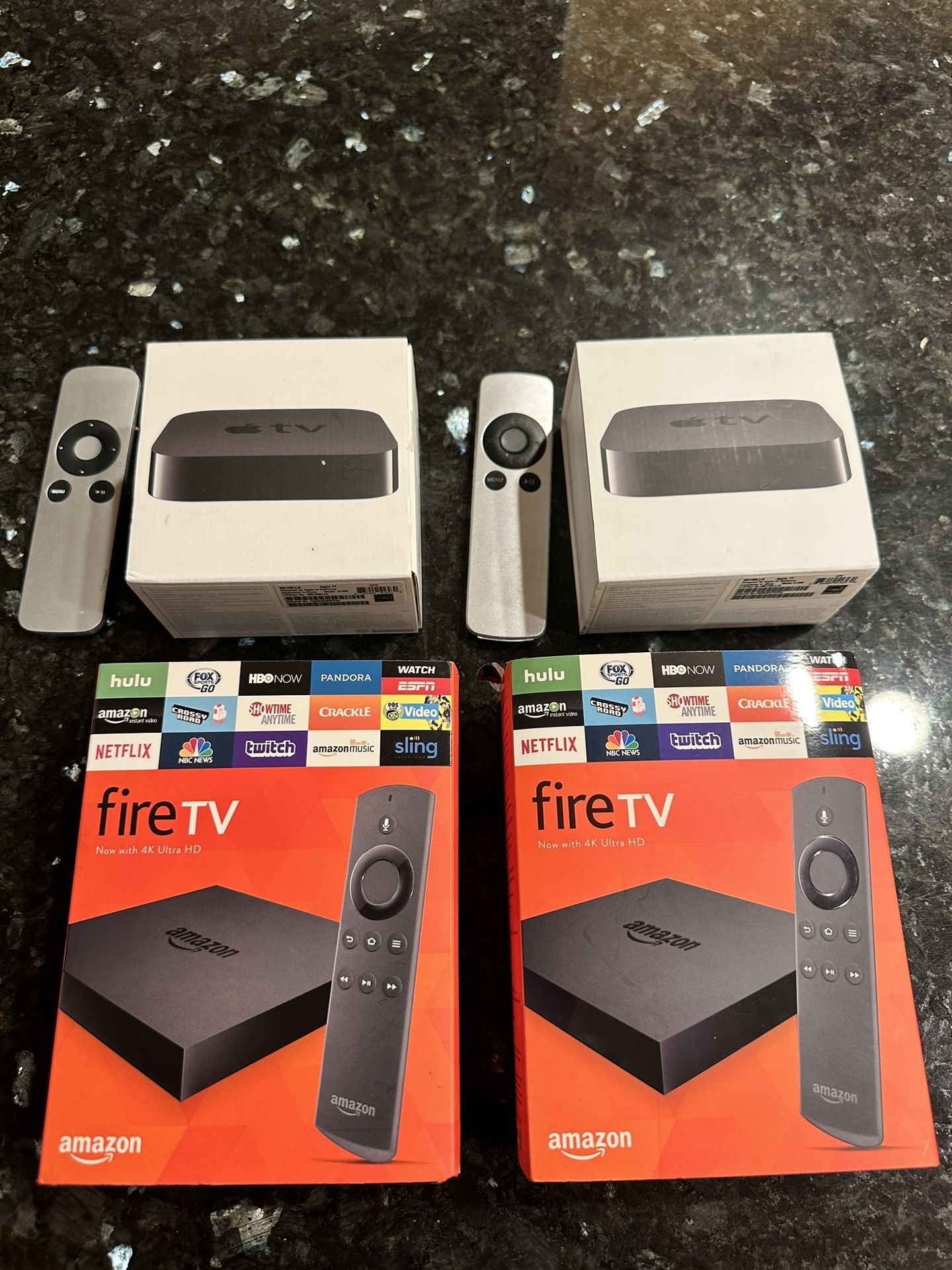 2 Apple TV Old Generation And 2 Fire Tv Boxes
