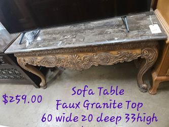 Sofa Table Faux granite topWe are located at 2811 East Bell road. Another Time Around Furniture.