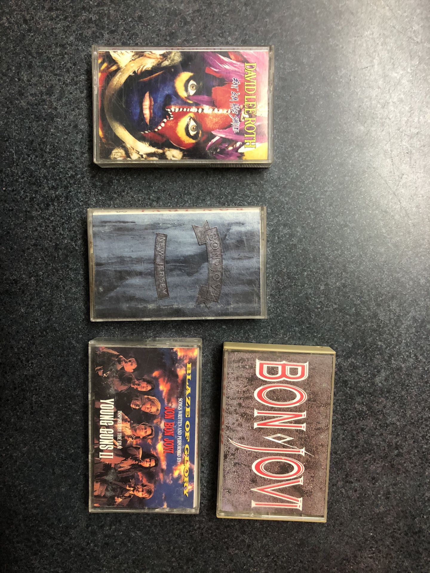 Bon Jovi and David Lee Roth Cassettes - titles are pictured