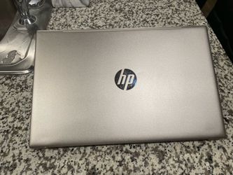 HP Pavilion 15-eg0050wm laptop in good condition. Intel Core i5, 20GB RAM, and charger included. Works great with no issues. Has a small dent on one c