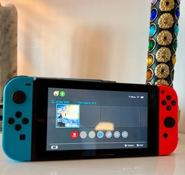 Nintendo Switch Console + Zelda BOTW + All Accessories