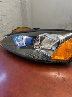 2003–2005 Dodge Stratus 2-door coupe(driver-side (left) halogen headlight)