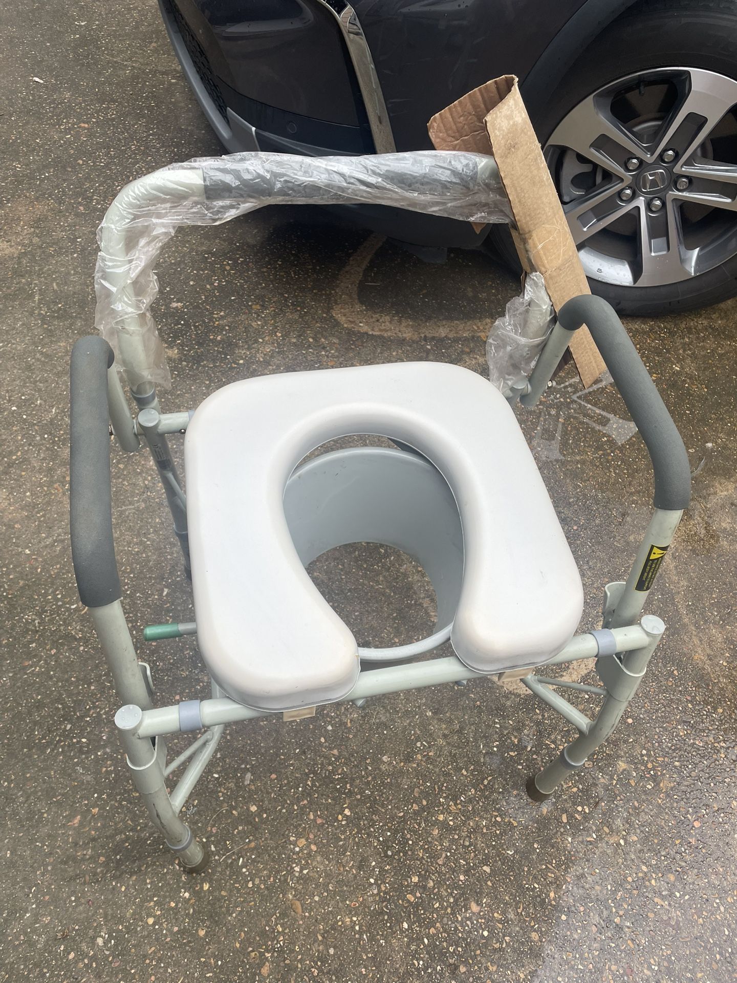 New  Bedside Commode
