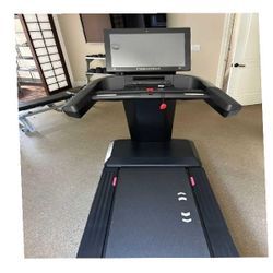 Sunny Health & Fitness Treadmill Shape Up at Home after behind