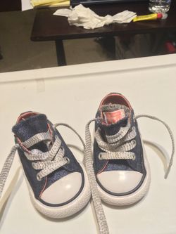 Girls Converse low top shoes