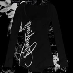 Black bodysuit sleeve with white writing