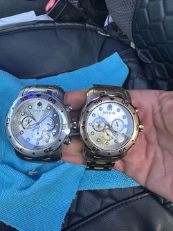Gold and silver Invicta watches