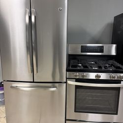 GE french door refrigerator &. LG 5 burner gas range set stainless steel 