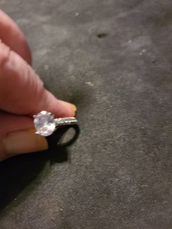 Size 6 silver ring with cubic zirconia stone. .