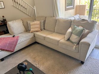 White Ashley Furniture 110in Sectional Sofa with LAF Chaise